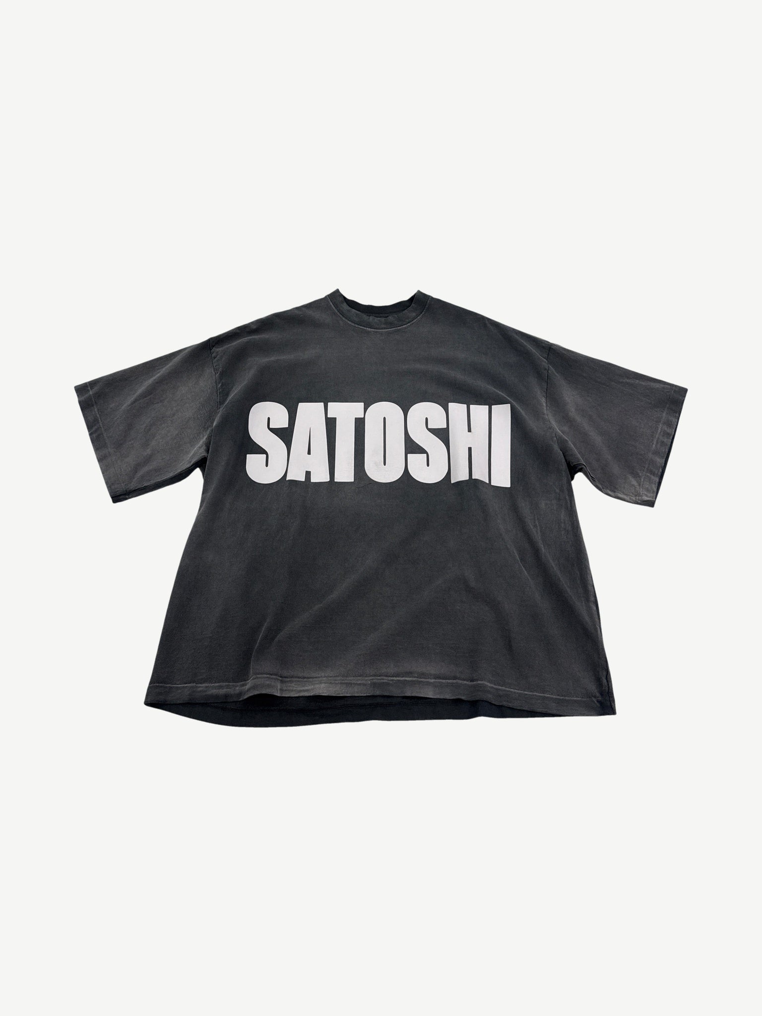 Satoshi Nakamoto faded black tee with oversized white SATOSHI Impact font chest print and boxy heavyweight fit.