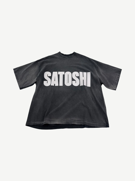 Satoshi Nakamoto faded black tee with oversized white SATOSHI Impact font chest print and boxy heavyweight fit.