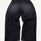 Satoshi Nakamoto black mesh moto sweatpants back view with side padding panels and paint splatter detail