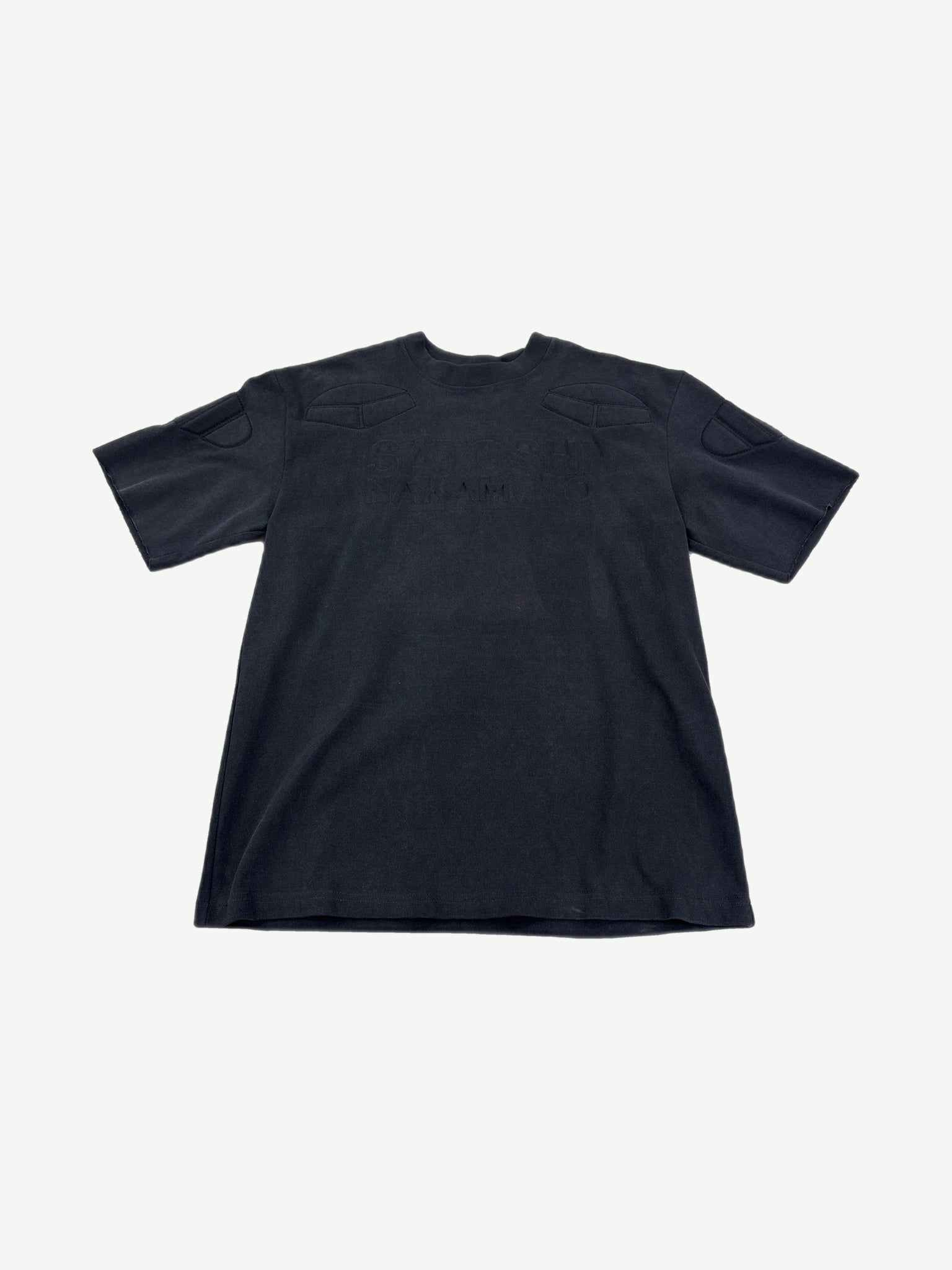 Satoshi Nakamoto black moto tee front with tonal embossed padded shoulder and chest panels.