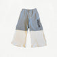 Satoshi Nakamoto gray sweatpants front with vertical Satoshi leg print, drawstring waist and cream waffle knit lower panel