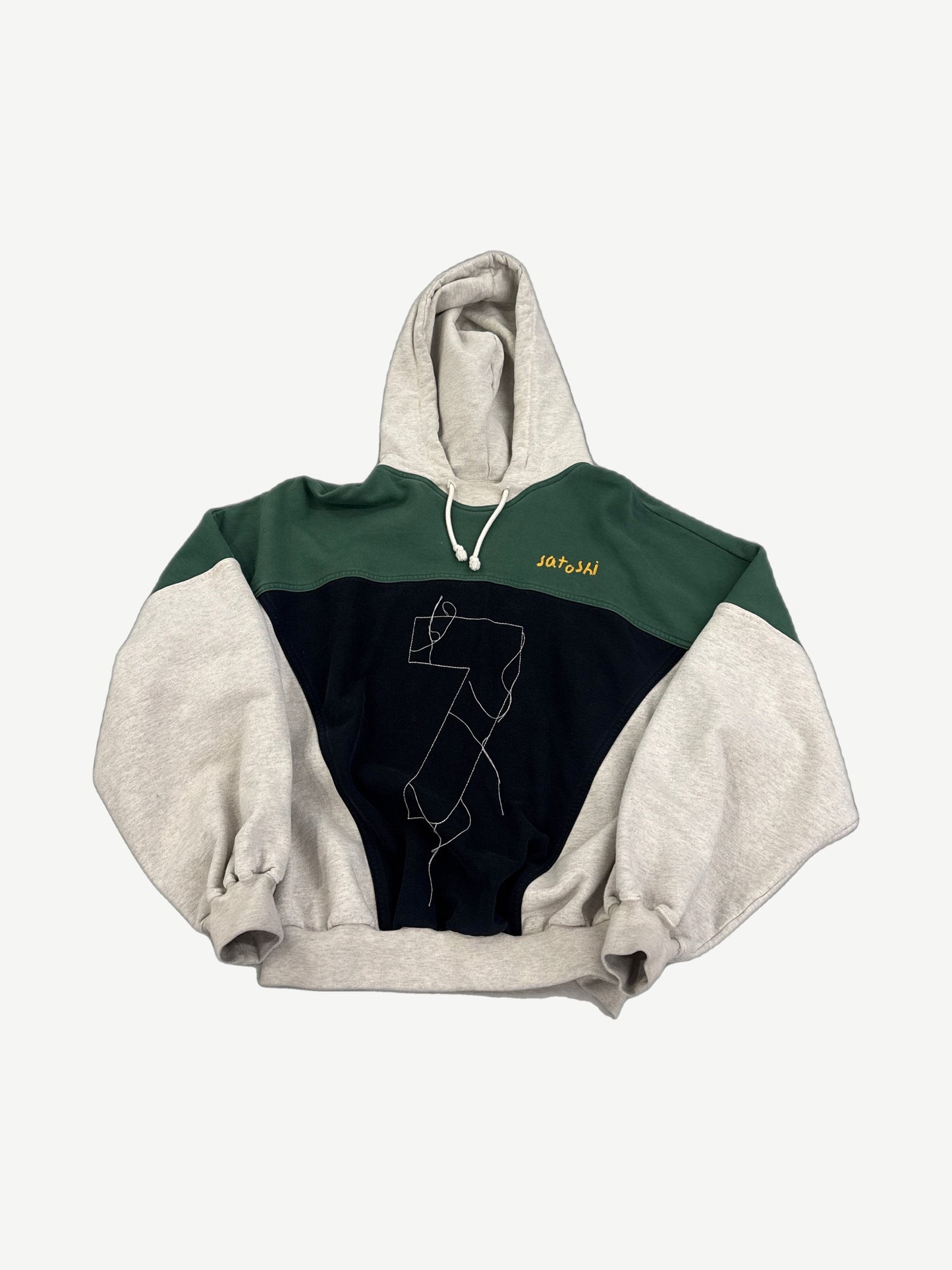 Satoshi Nakamoto crossover hoodie with green and gray color-blocked panels, kangaroo pocket and drawcord hood.
