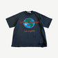 Satoshi Nakamoto washed black 1969 Rock tee with globe graphic, red Los Angeles script and distressed hem