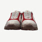 Sicko x 424 hiking shoes front pair view, white and red uppers with Sicko branded toe caps and mud-effect sole.
