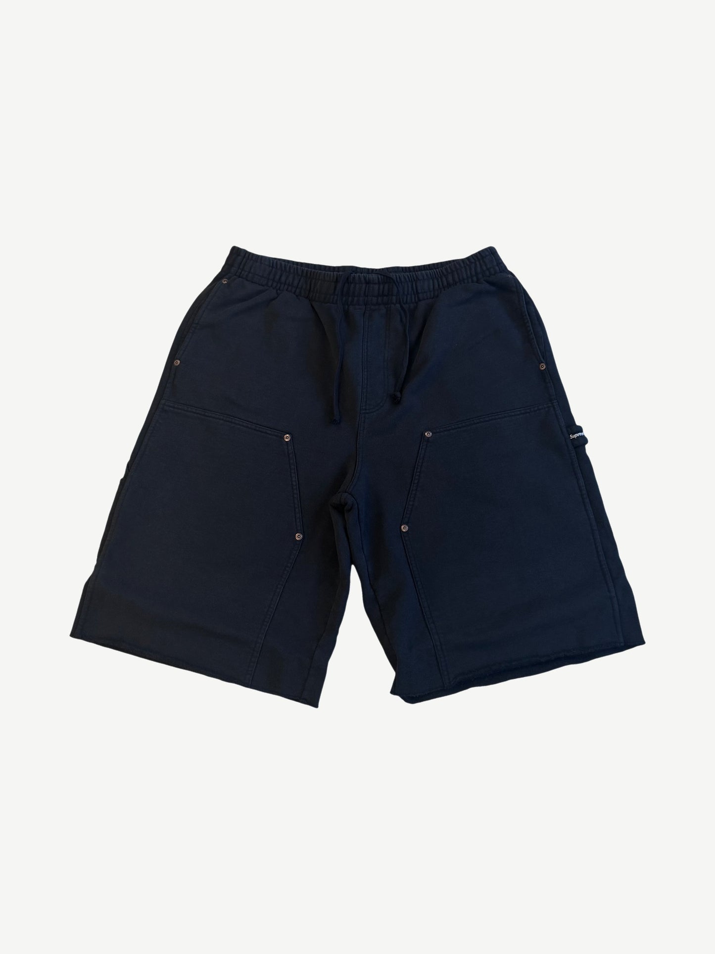 Supreme black double knee painter sweat shorts front, drawstring waist with riveted utility pockets