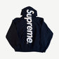 Supreme black satin applique hoodie back with large vertical Supreme satin patch logo down center spine.