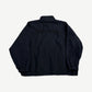 Supreme Umbro black track jacket back with tonal black Supreme box logo embroidery at upper shoulders
