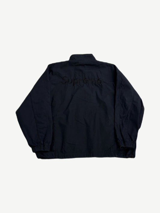 Supreme Umbro black track jacket back with tonal black Supreme box logo embroidery at upper shoulders