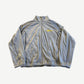 Supreme grey velour mesh track jacket front view with full zip and yellow script chest logo.
