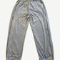 Supreme grey velour mesh track pants back view with elastic cuffs and black side stripe