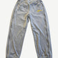 Supreme grey velour mesh track pants with yellow script logo at hip and black side piping