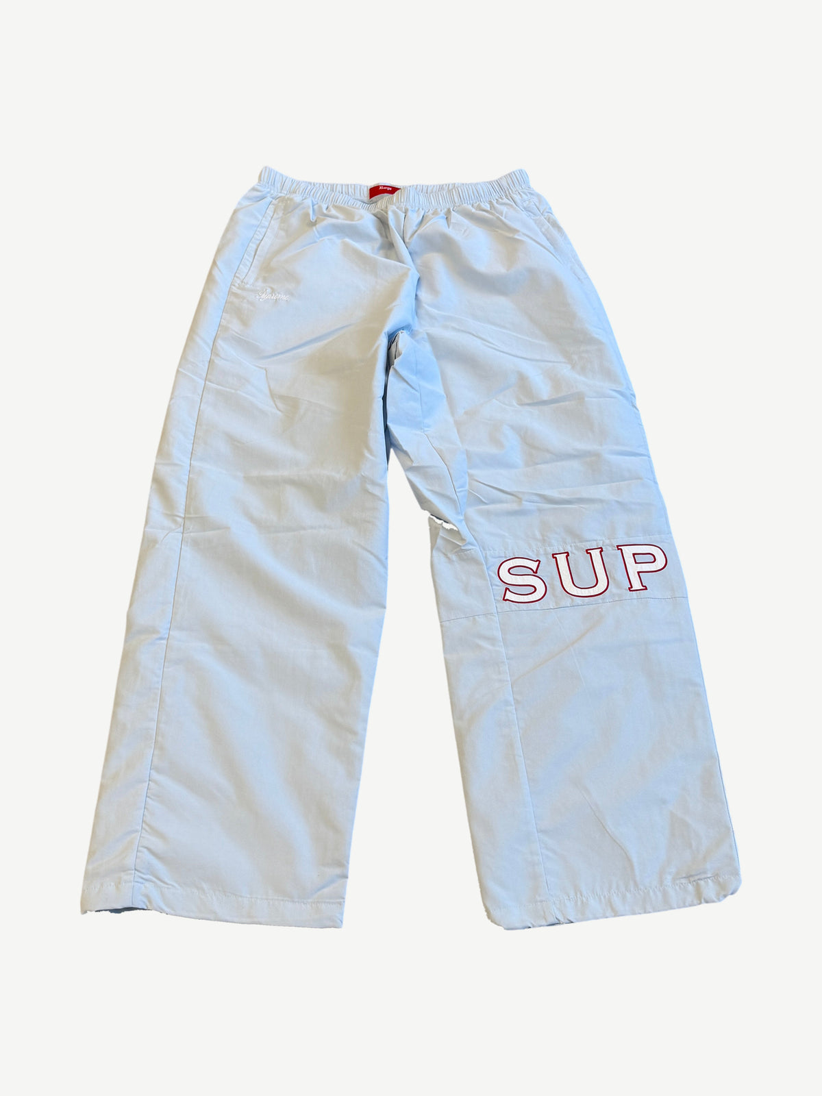 Supreme Light Blue Cross Track Pants