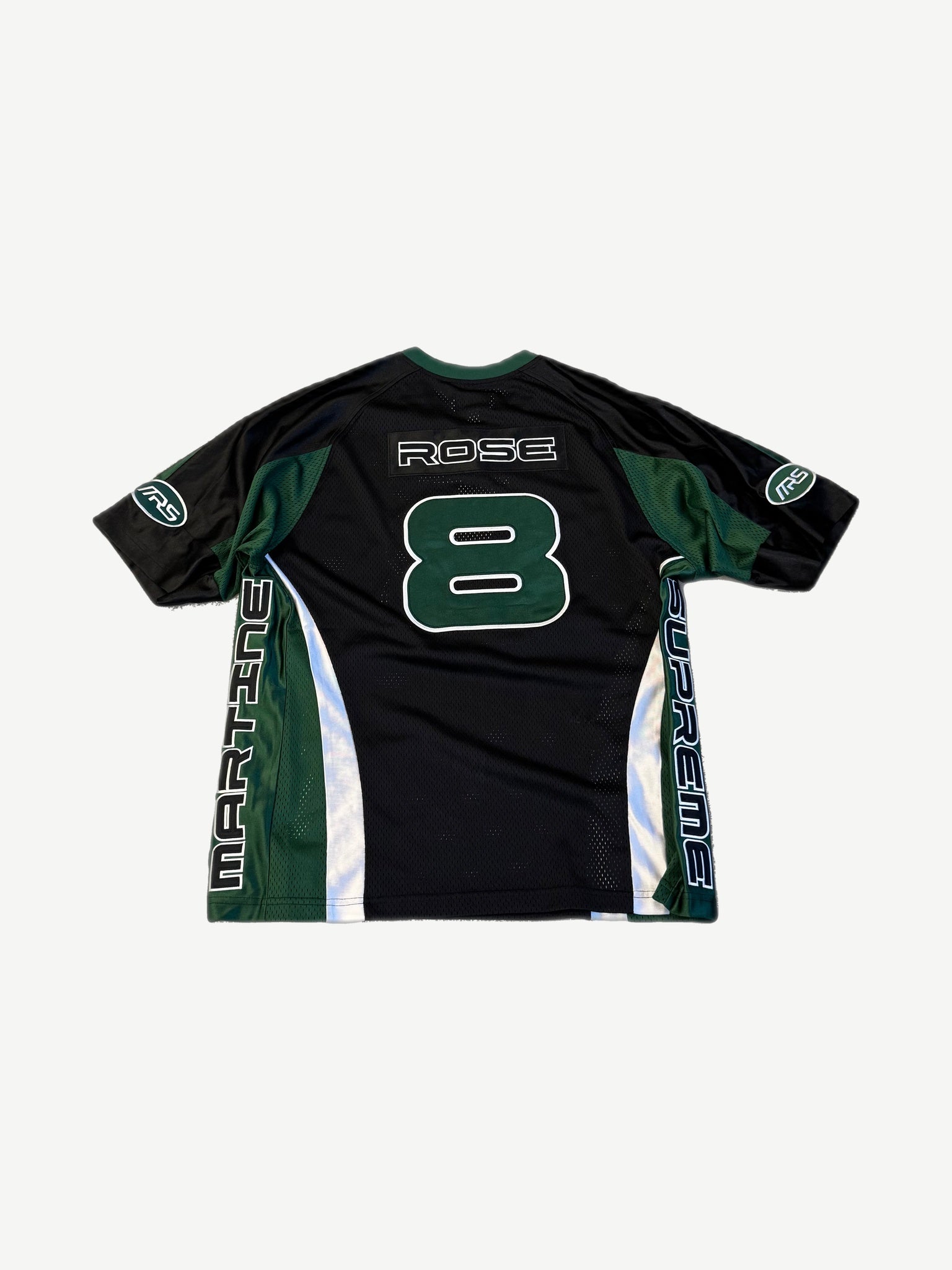Supreme Martine Rose black football jersey back, large green ROSE 8 nameplate on mesh paneled jersey.