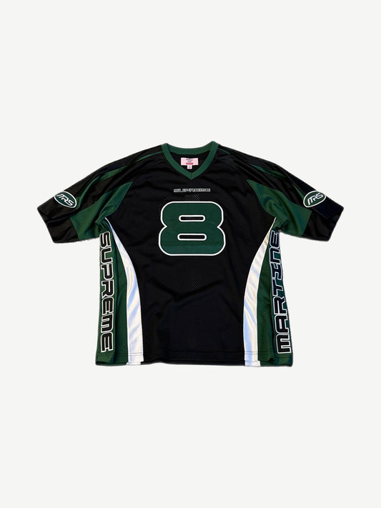 Supreme x Martine Rose black football jersey with green number 8, V-neck mesh and chest logo embroidery.
