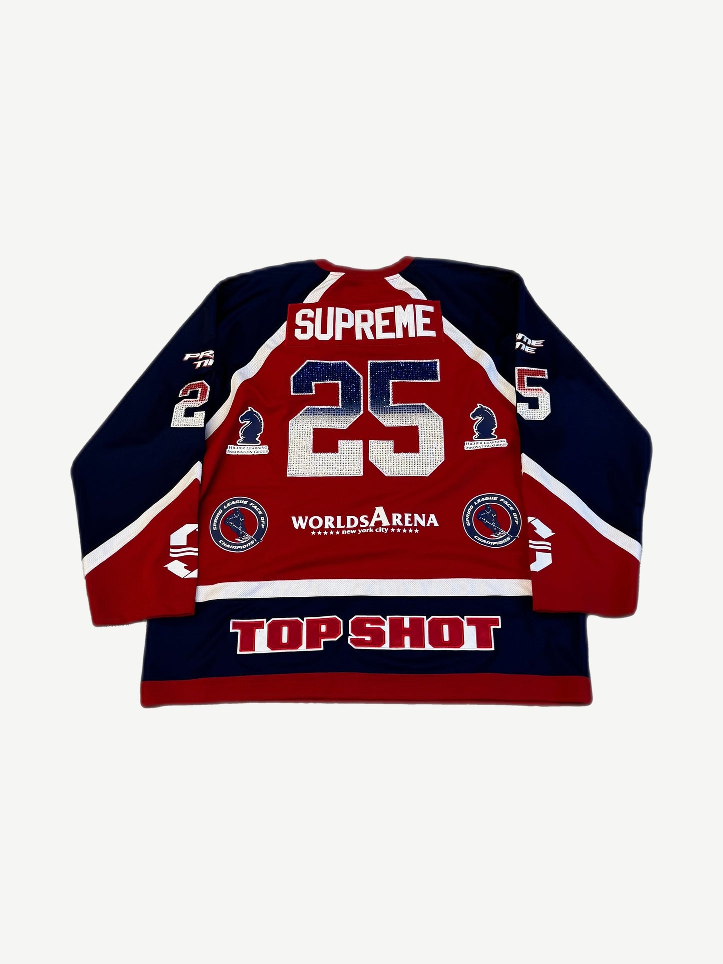 Back of Supreme rhinestone hockey jersey with crystal SUPREME nameplate, number 25 and Top Shot hem text