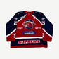 Supreme red and navy rhinestone hockey jersey with panther crest, WFST patches and team sponsor graphics