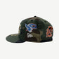 Supreme camo New Era fitted cap side view with embroidered eagle P, tiger and orange R mascot logos