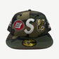 Supreme woodland camo New Era 59Fifty fitted cap with embroidered S logo and college mascot patches
