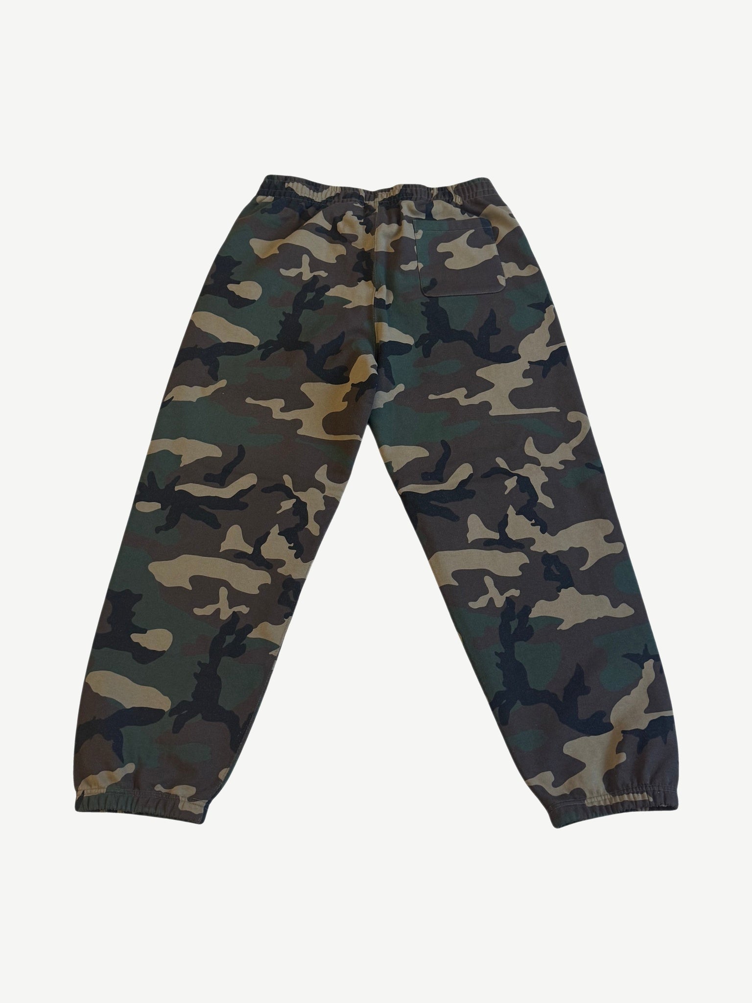 Supreme woodland camo applique sweatpants back view with patch pocket and elastic cuffs