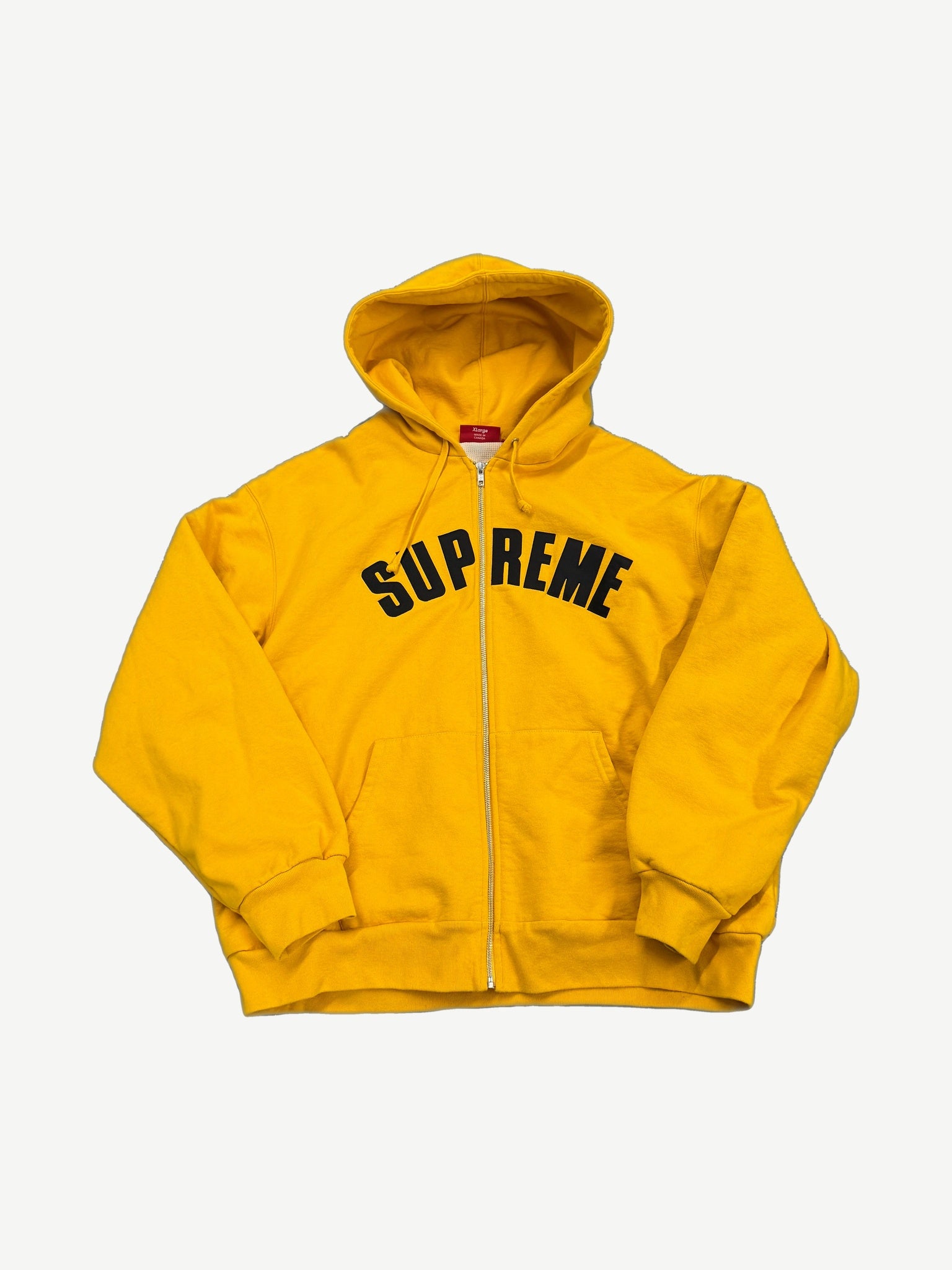 Supreme yellow thermal-lined zip-up hoodie front with black arched Supreme chest logo and full zipper