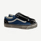 Vans Vault OG Old Skool LX 36 sneakers in black and navy pearlized leather with classic white jazz stripe.