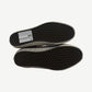 Sole view of Vans Premium Old Skool sneakers showing signature waffle tread pattern with Vans label