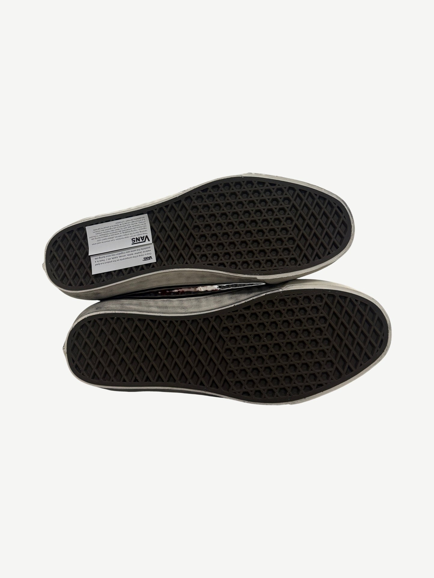 Sole view of Vans Premium Old Skool sneakers showing signature waffle tread pattern with Vans label