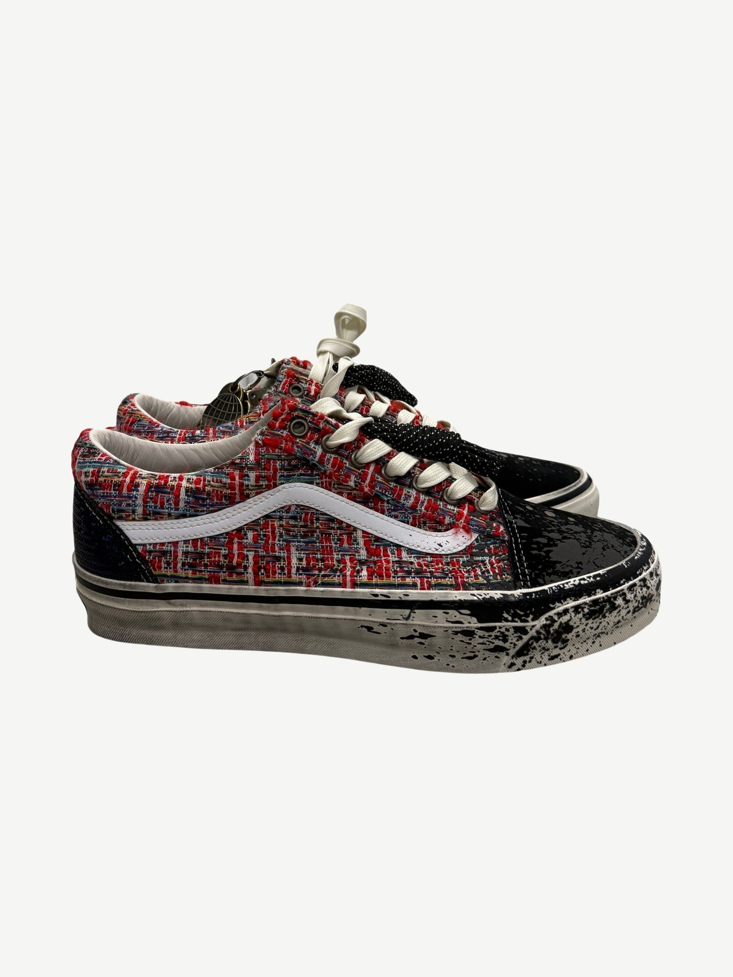 Vans Premium Old Skool sneaker with red tweed upper, paint-splattered black toe and silver lace charms