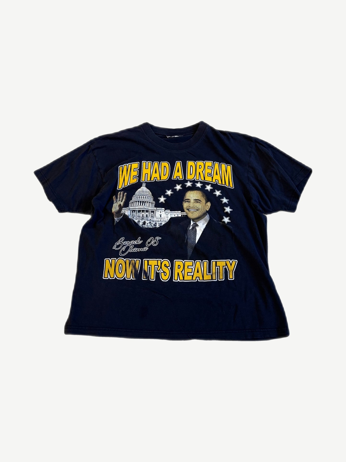 Vintage 2008 Barack Obama navy tee with yellow We Had A Dream Now It's Reality Capitol graphic print.