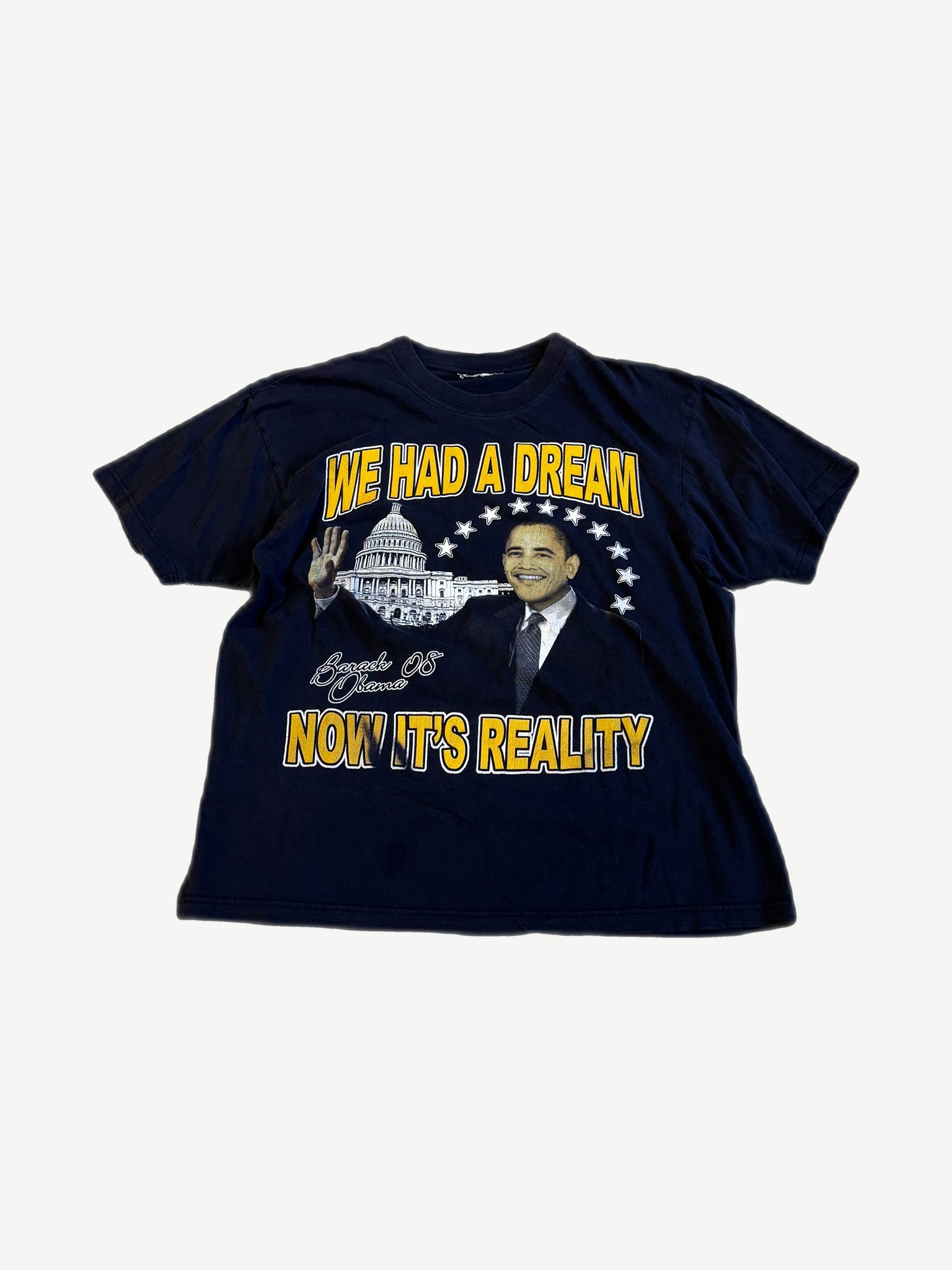 Vintage 2008 Barack Obama navy tee with yellow We Had A Dream Now It's Reality Capitol graphic print.