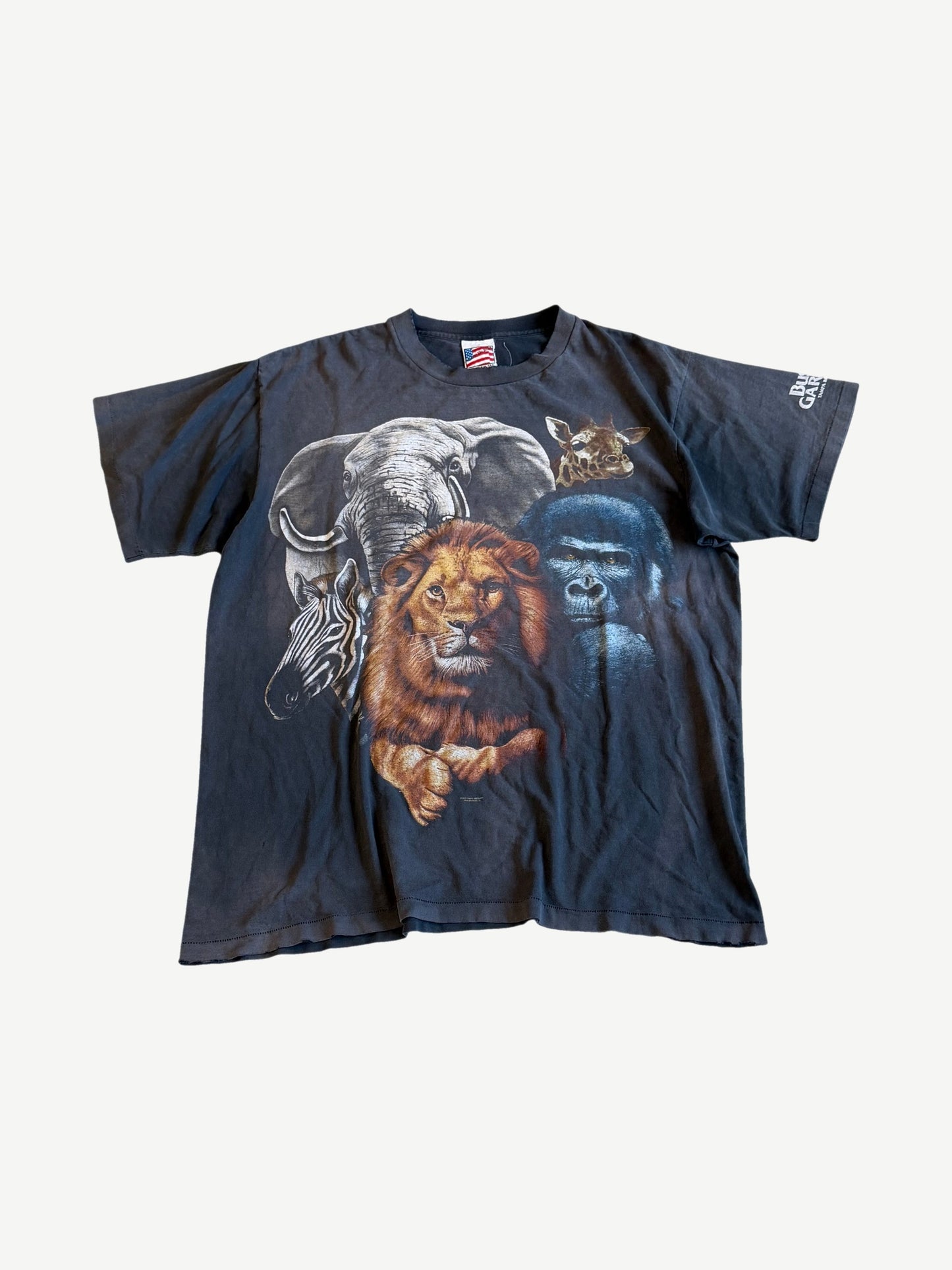 Vintage Busch Gardens faded black tee front with lion gorilla elephant zebra giraffe animal collage print