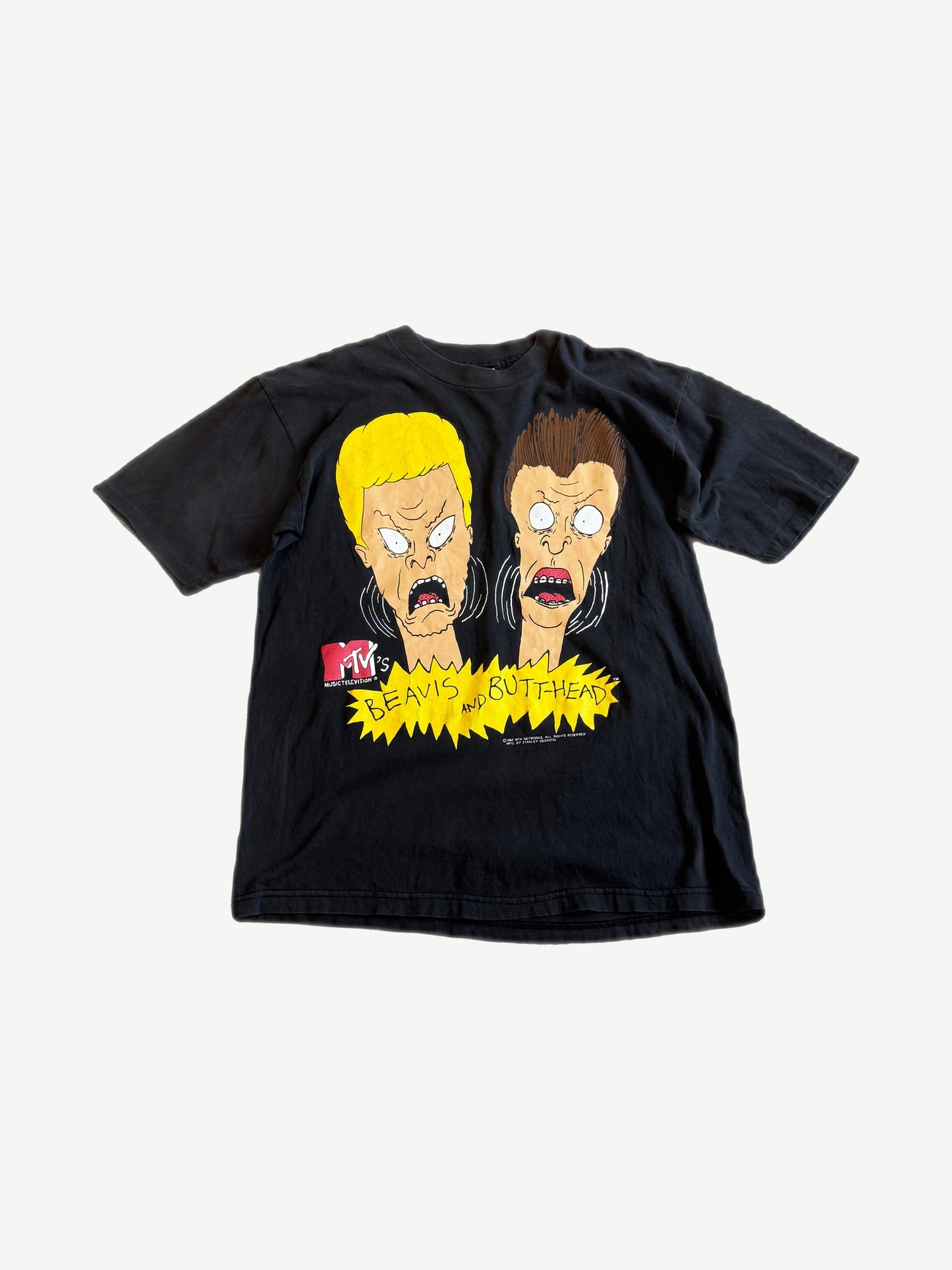 Vintage MTV Beavis and Butt-Head black tee with cartoon character headshots and yellow burst logo