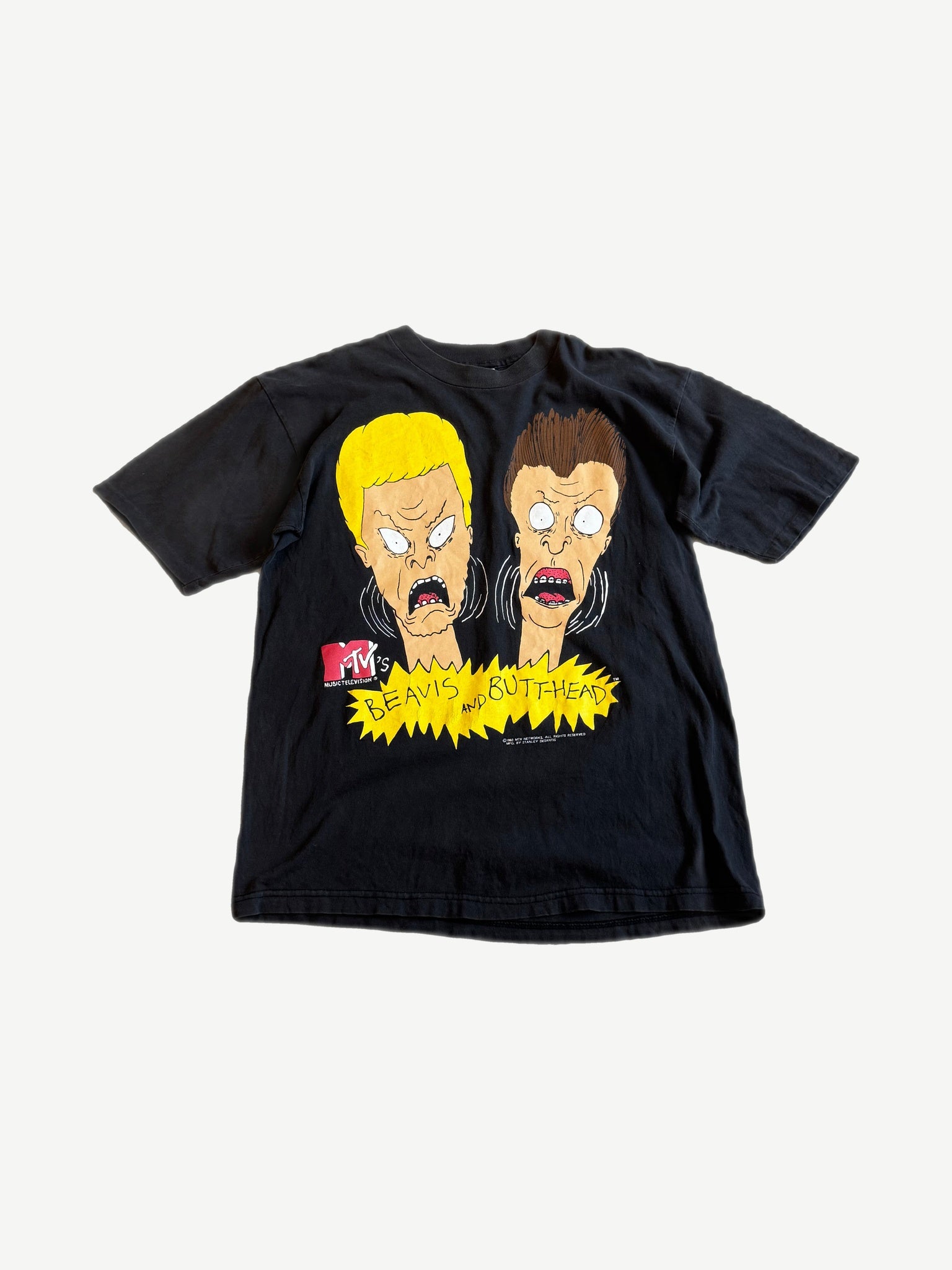 Vintage MTV Beavis and Butt-Head black tee with cartoon character headshots and yellow burst logo