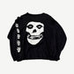 Vintage Misfits black longsleeve front with large white Crimson Ghost skull graphic and skulls down left sleeve