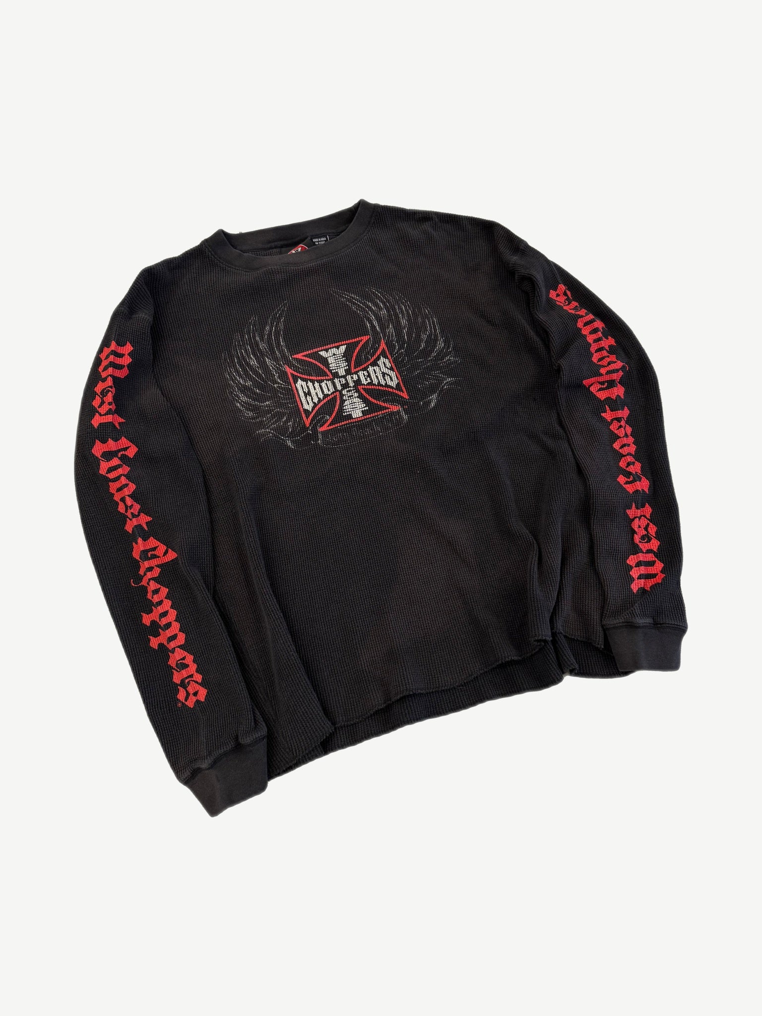 Vintage West Coast Choppers black waffle thermal angled view, iron cross chest and red sleeve script