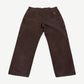 Vintage Carhartt faded brown canvas double-knee work pants with utility pockets and leather waist tab.