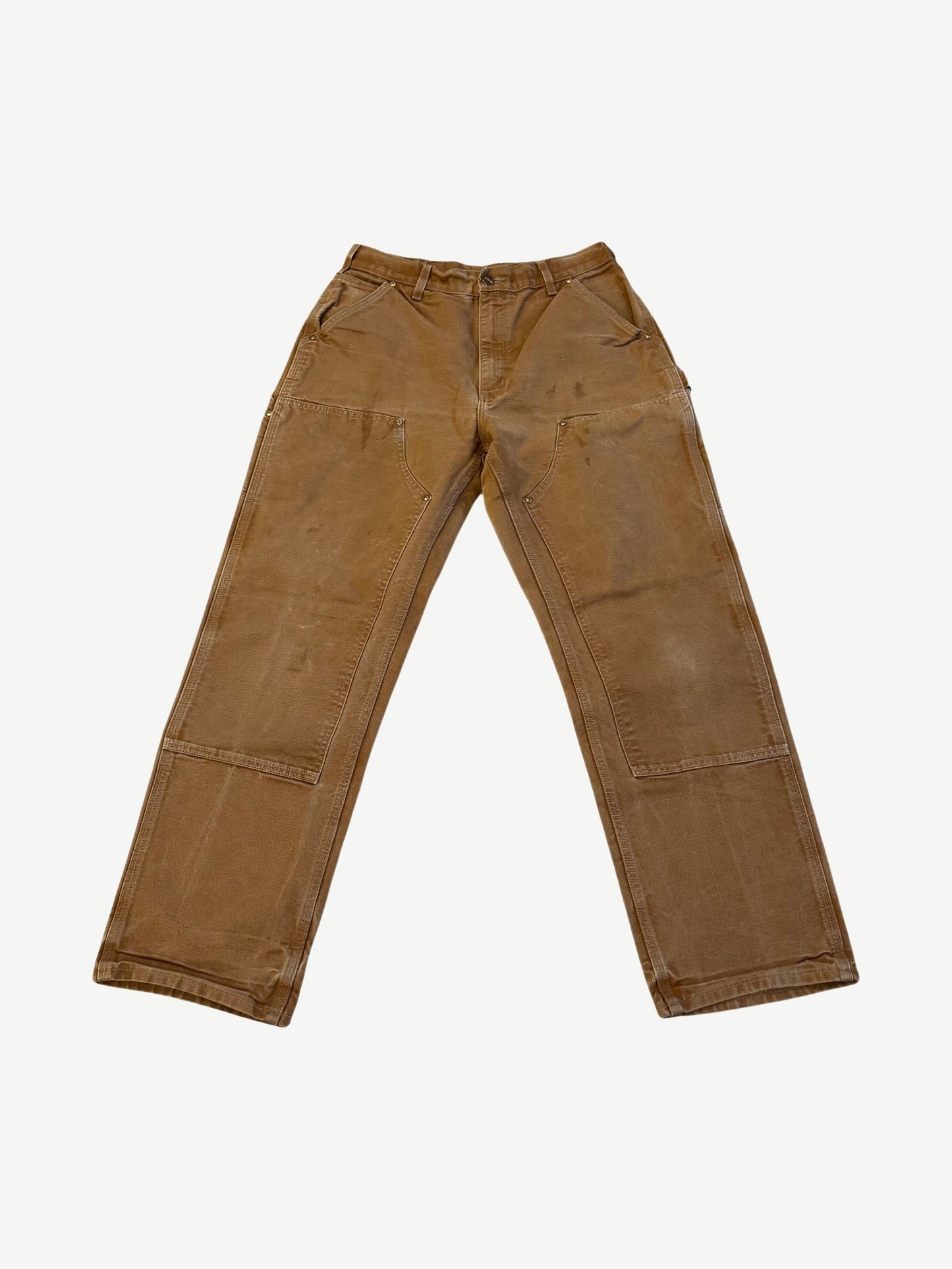 Vintage Carhartt brown duck canvas double knee carpenter pants front view with utility pockets and rivets