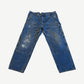 Vintage Carhartt medium wash denim double knee carpenter pants with paint splatter and utility hammer loop.