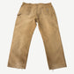 Vintage Carhartt tan carpenter pants back view showing utility pockets, hammer loop and Carhartt label