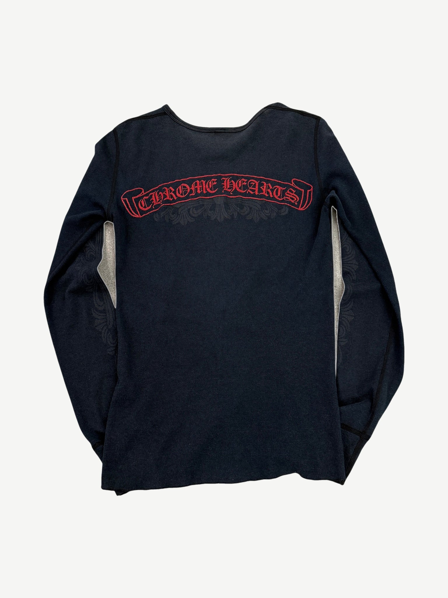Vintage Chrome Hearts thermal longsleeve back view with red gothic scroll banner logo on black waffle knit