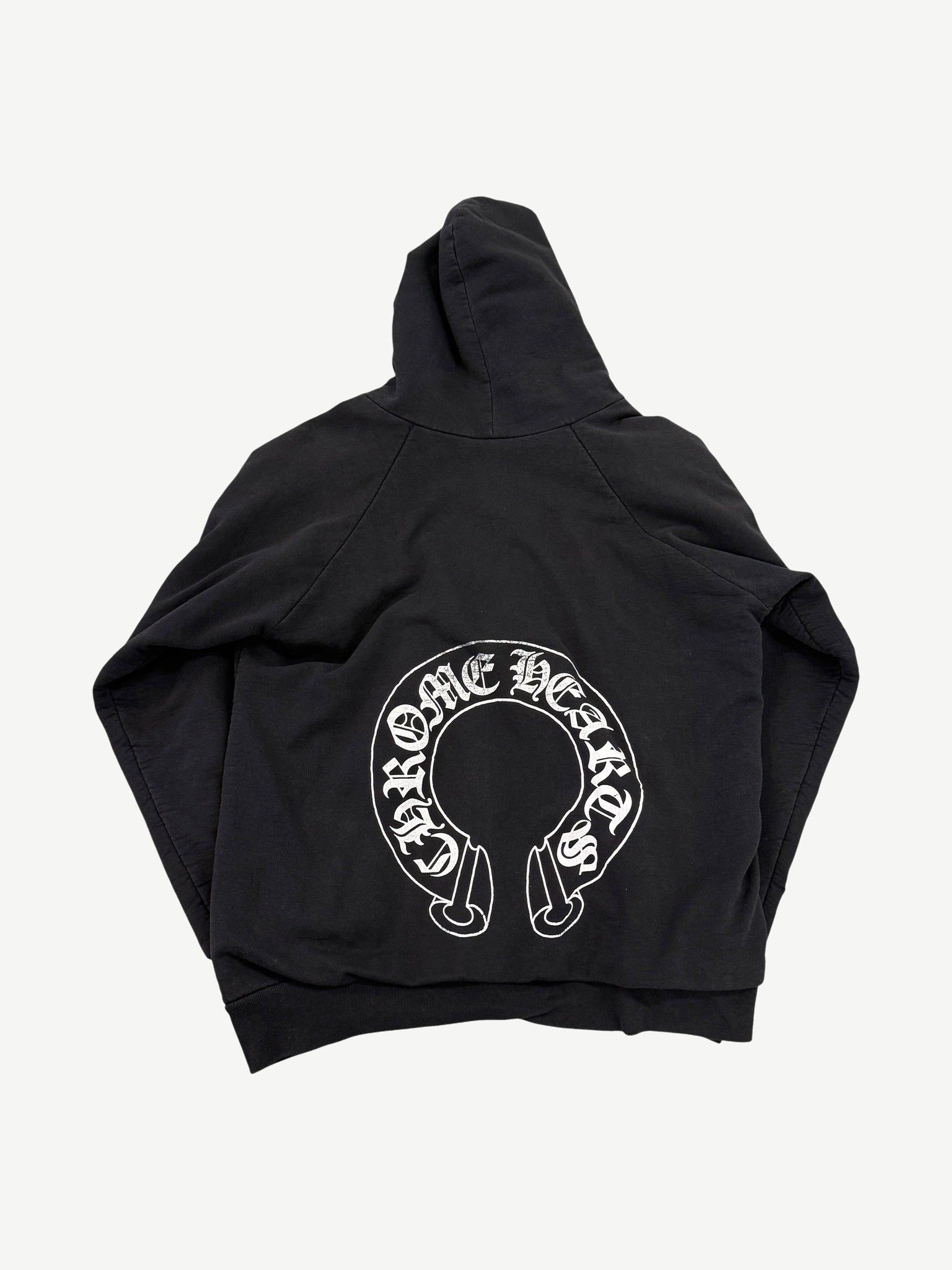 Chrome Hearts black zip-up hoodie back with large white Old English Chrome Hearts horseshoe logo graphic