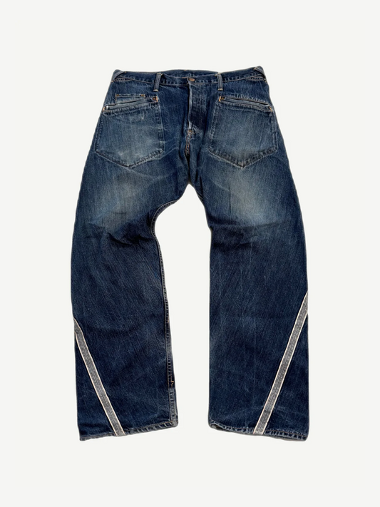 Vintage Evisu Japanese raw denim jeans front view with selvedge inseam detail and dark indigo wash