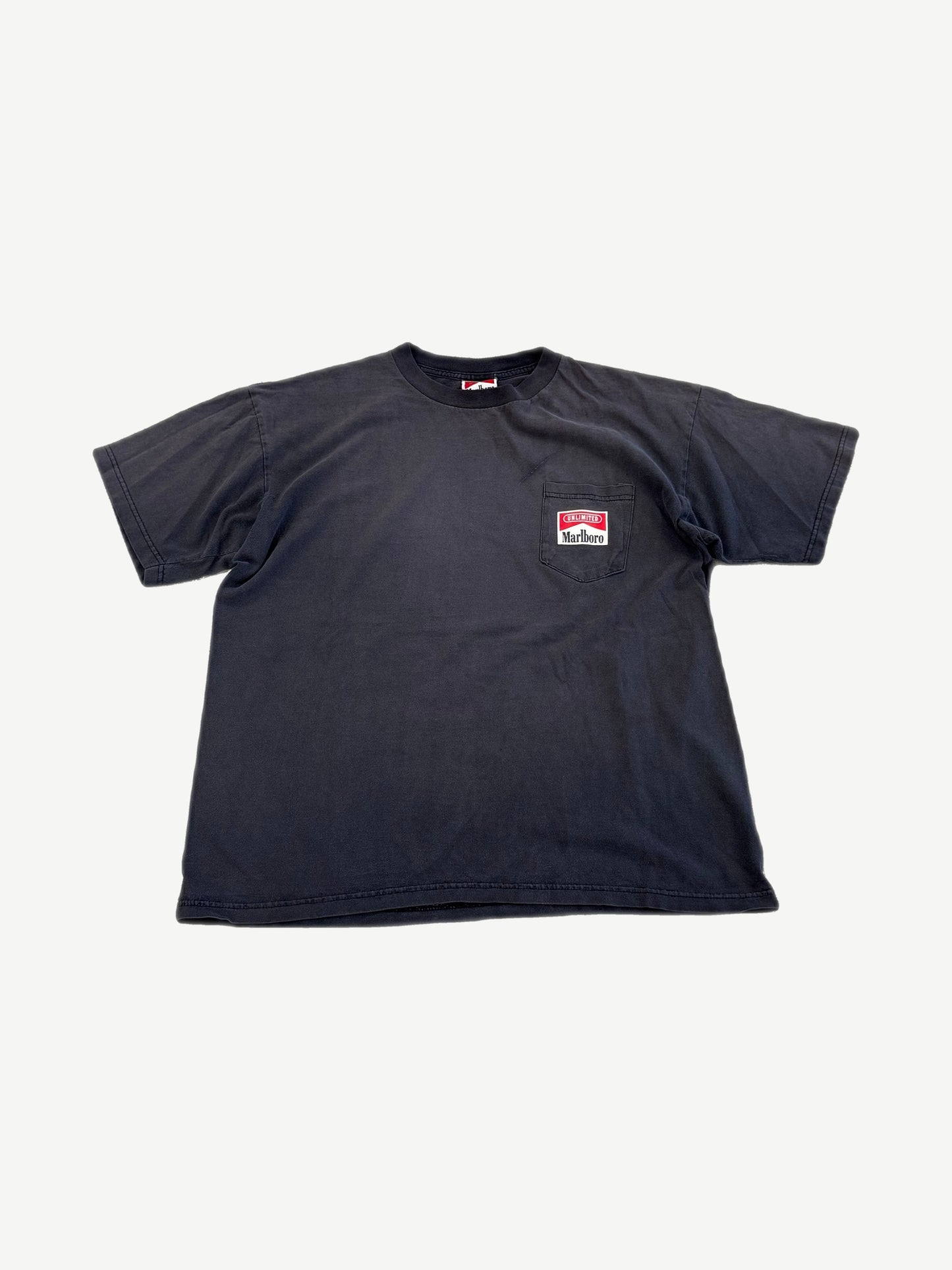 Vintage Marlboro Unlimited faded black pocket tee with red and white Marlboro chest pocket patch.