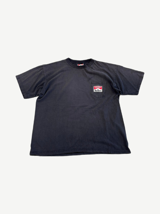 Vintage Marlboro Unlimited faded black pocket tee with red and white Marlboro chest pocket patch.