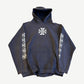 Vintage West Coast Choppers hoodie in sun-faded navy with iron cross chest logo and stacked sleeve prints.