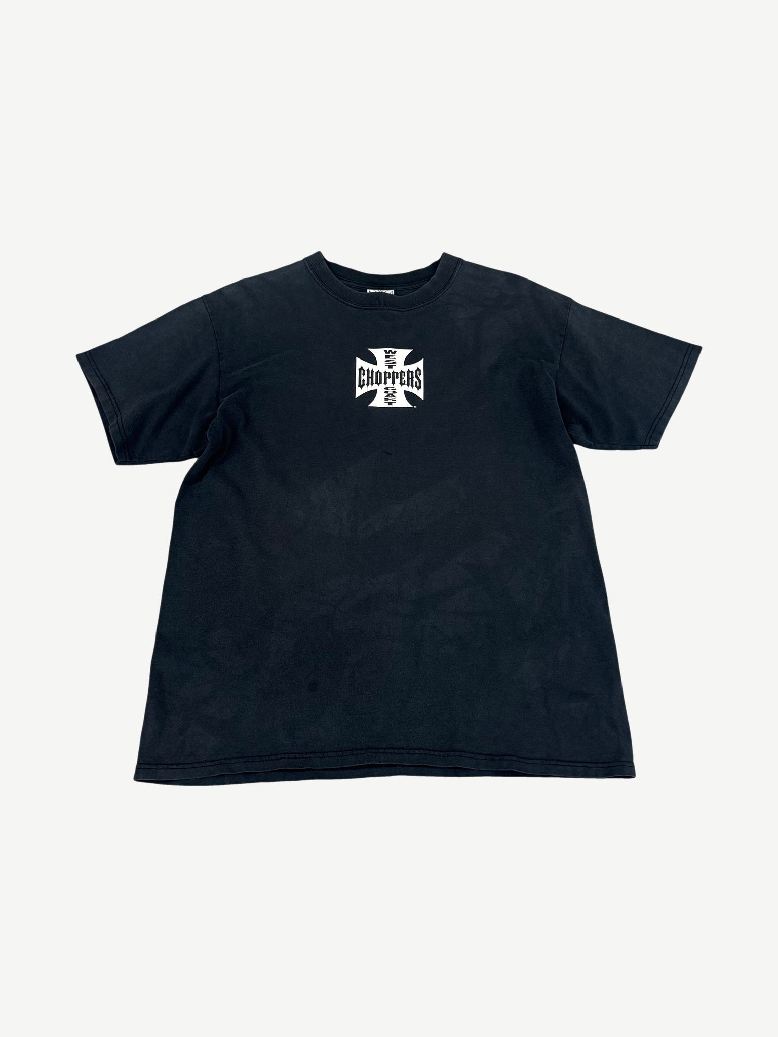 Vintage faded black West Coast Choppers tee with small white iron cross logo printed center chest