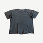 Vintage George Foreman black boxing tee back view with sun faded jersey and distressed pinholes