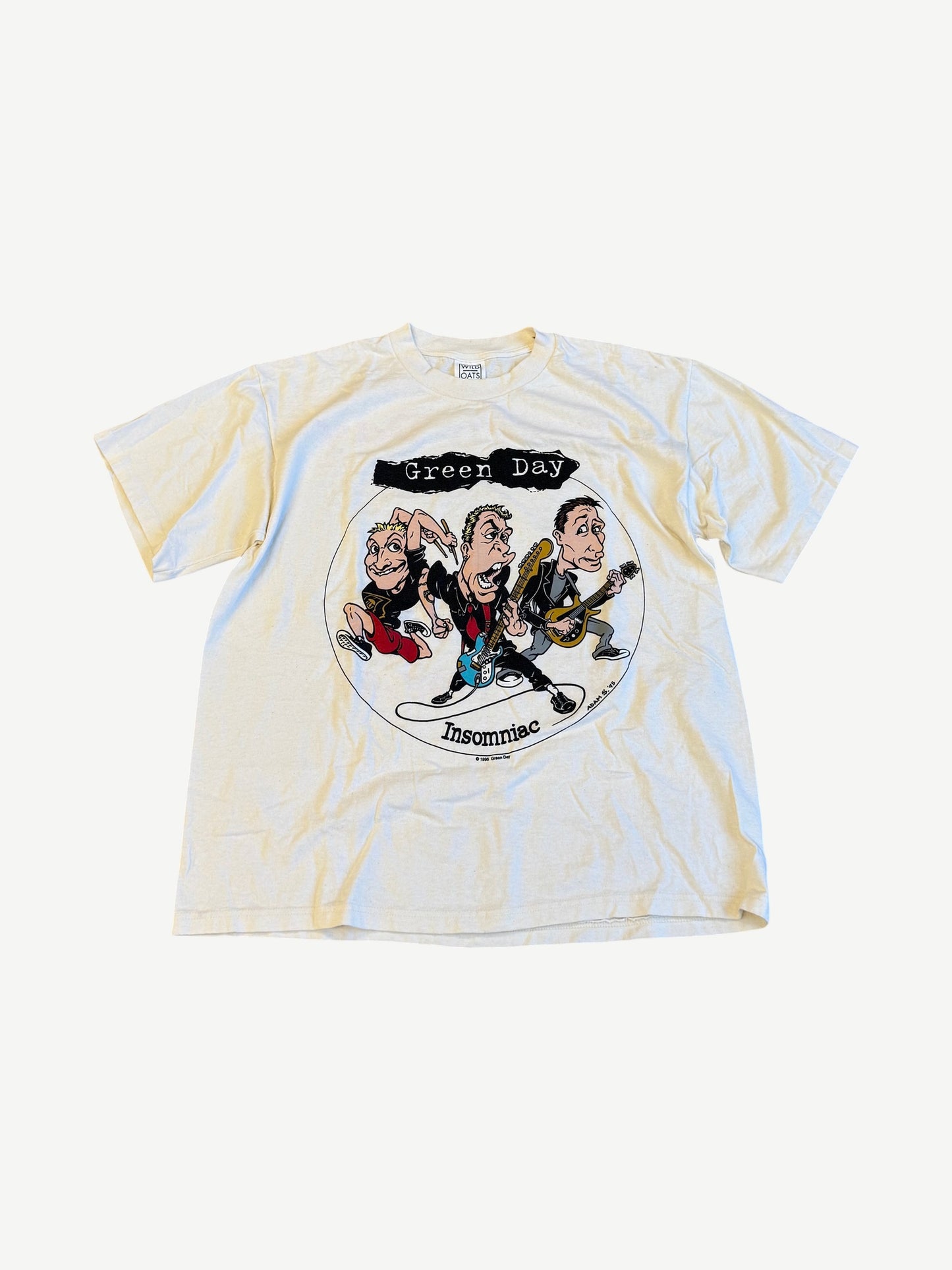 Vintage Green Day Insomniac tour tee in cream with cartoon band illustration and Insomniac logo print.