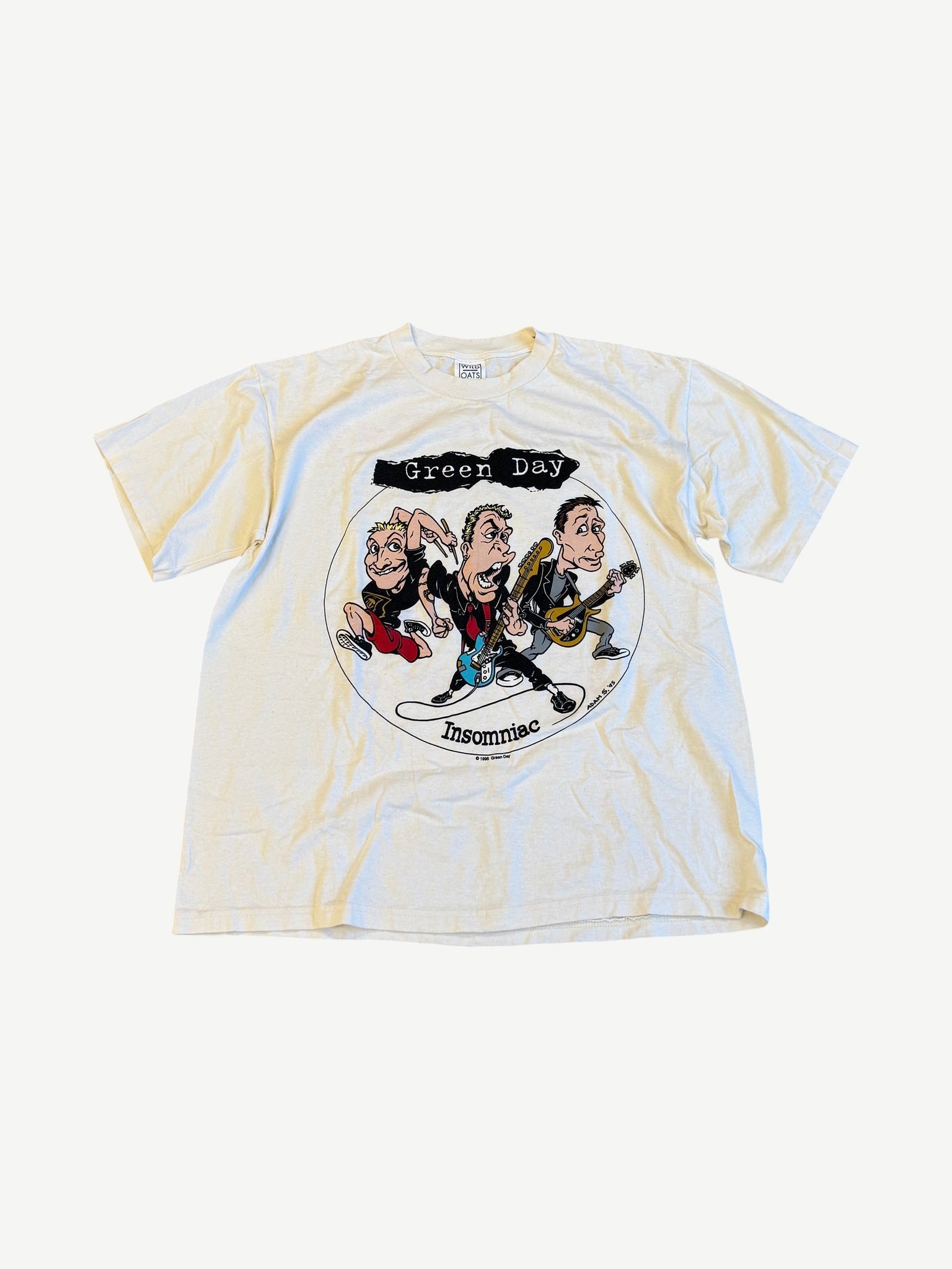 Vintage Green Day Insomniac tour tee in cream with cartoon band illustration and Insomniac logo print.