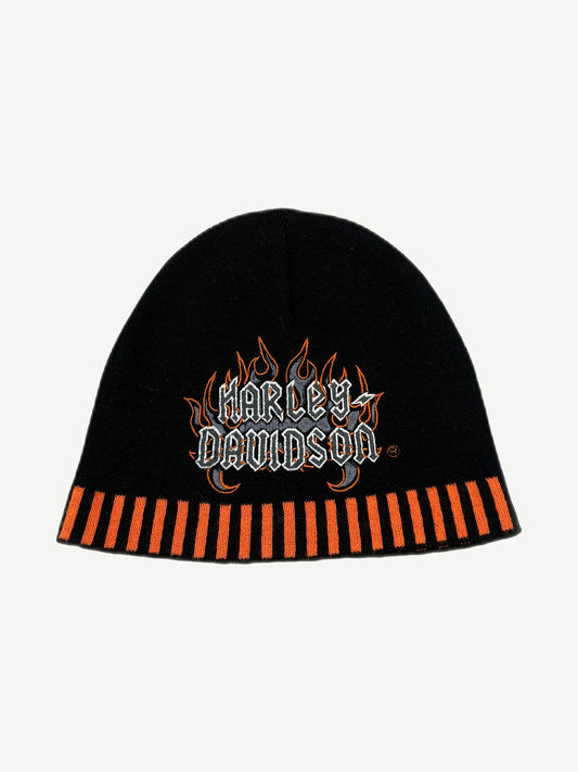 Vintage Harley-Davidson black knit beanie front with embroidered flame logo and orange piano-key cuff stripes